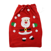 Sarkans filca maiss ar Ziemassvētku vecīti un sniegu